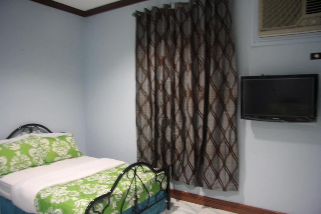 Bushida Bed And Breakfast Puerto Princesa Quarto foto